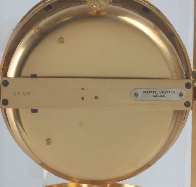 A French gilt brass Art Deco Reutter atmos timepiece, circa 1930 For Sale 1