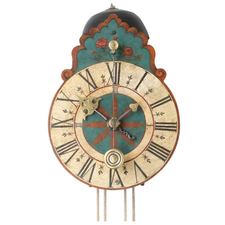 A South German polychrome painted wall clock, circa 1710 For Sale