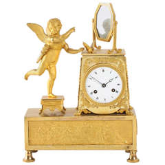 A French Empire ormolu sculptural mantel clock, circa 1810