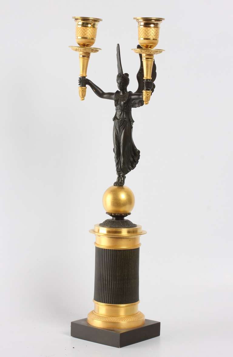A pair of French gilt and patinated bronze 2-light  candelabra, circa 1830. 3