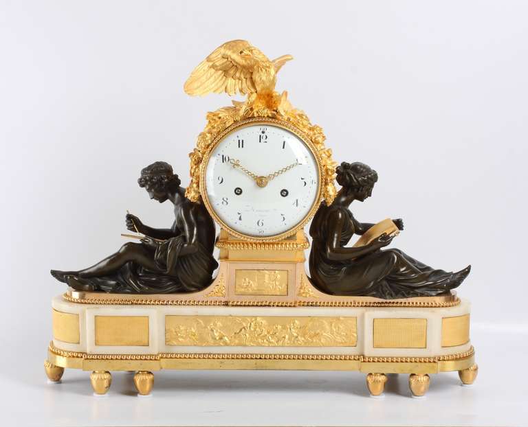 enamel dial with Arabic numerals signed Maniere and fine gilt pierced hands, spring-driven movement with anchor escapement and silk suspended pendulum, half hour countwheel striking on a bell, finely cast and chiseled ormolu case surmounted by an