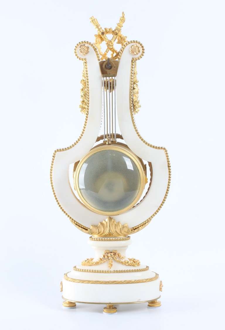 Glass French Louis XVI Style, Marble Lyre Clock with Oscillating Bezel For Sale