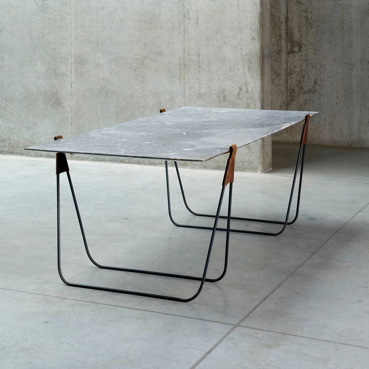 InVein is a marble trestle table with a plus. Once you turn the table top around, it doubles as a mirror and decorative object. The classic trestle table represents simplicity, mobility and efficiency. These qualities go against every single thing