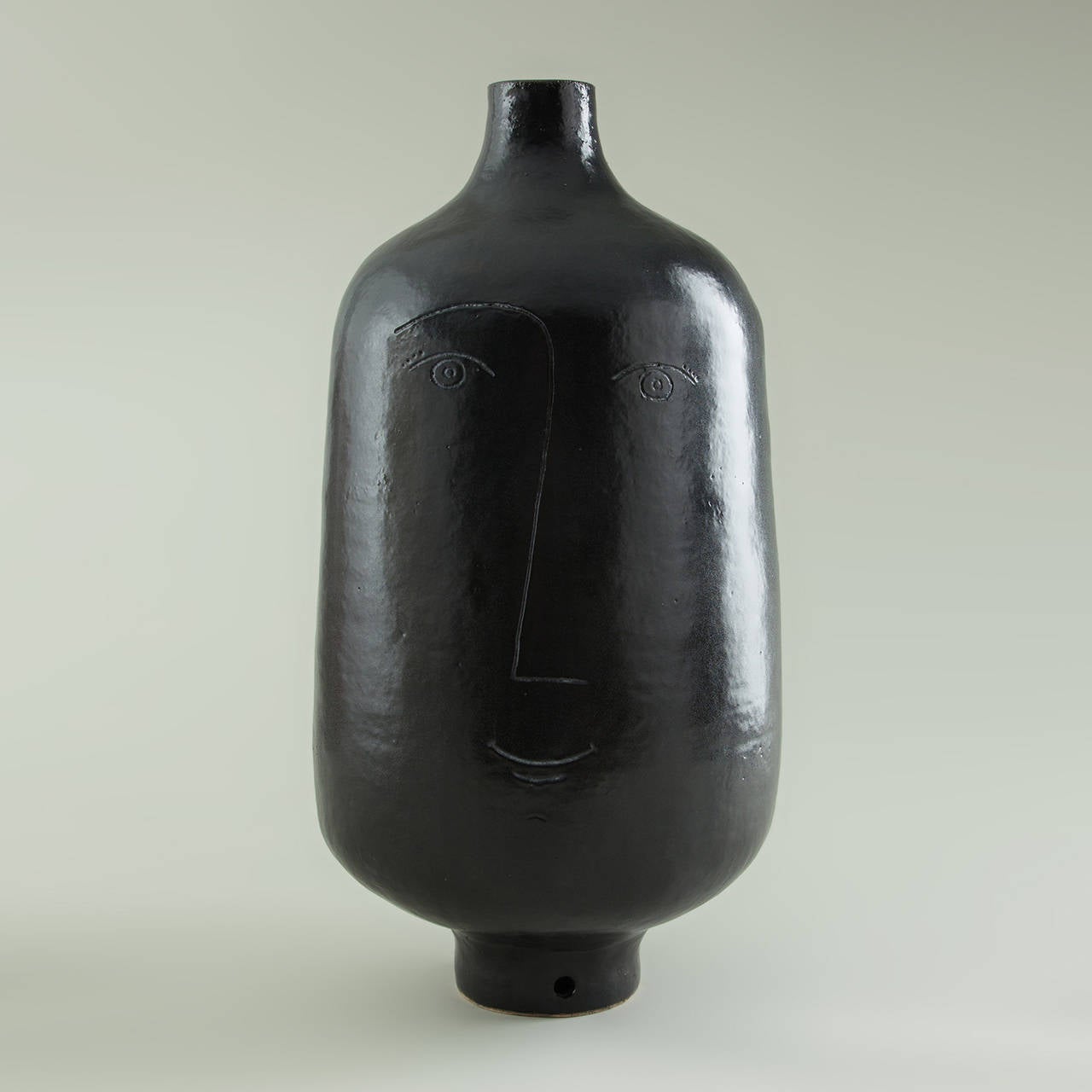 Black Enameled Stoneware Lamp by Dalo, 2014. Unique piece.

Dimensions: H 64 cm - Ø 35 cm

Dalo is a ceramic work­shop that reunites Paris ceramists Daniel and Loïc under a com­mon con­cept and know-how. Instantly rec­og­niz­able in their