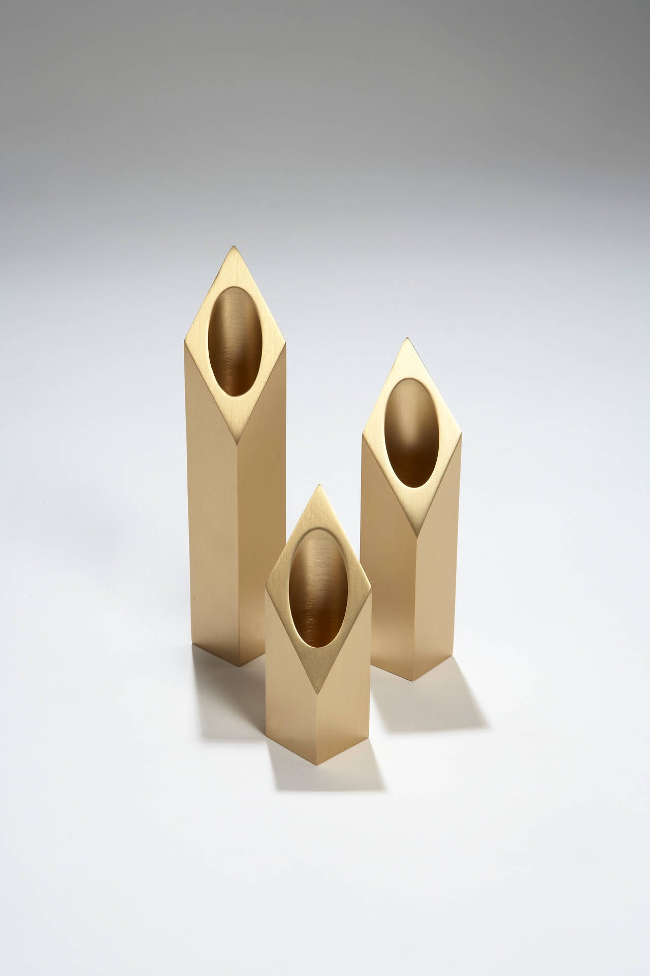 Cast brass
H : 18 / 14 / 10 cm
H : 7.5 / 5.5 / 3.9 inches
Capsule collection
Limited edition of 20

Interior designer and architect Hervé Langlais creates furniture with the purest of lines. His designs are enhanced by the elegance and