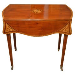 A Mahogany Inlaid Edwardian Period "Butterfly" Pembroke Table