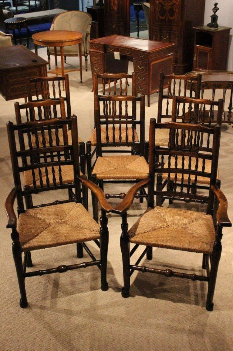 A Harlequin Set Of 8 19th Century Lancashire Spindle-Back Farmhouse Dining Chairs
