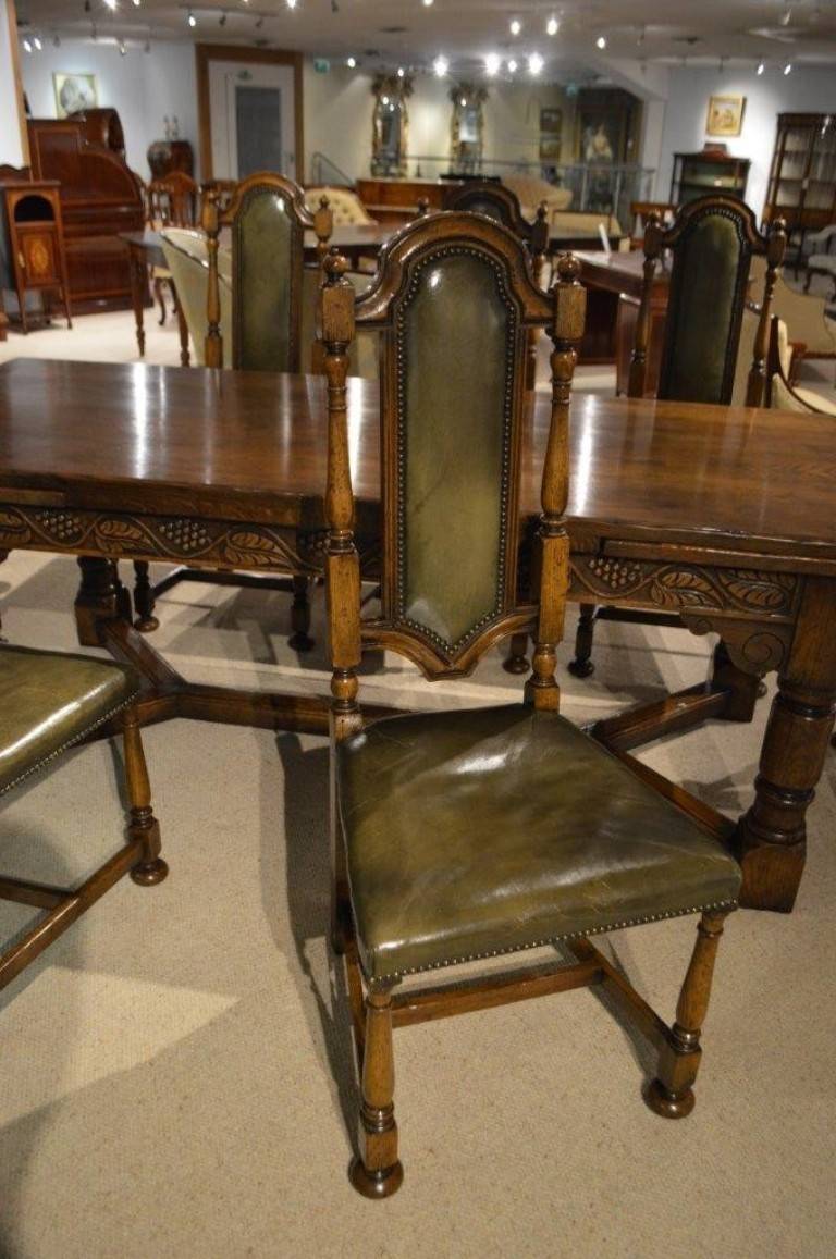 An Oak Jacobean Style Refectory Table And Set Of 12 Oak Dining Chairs. 3