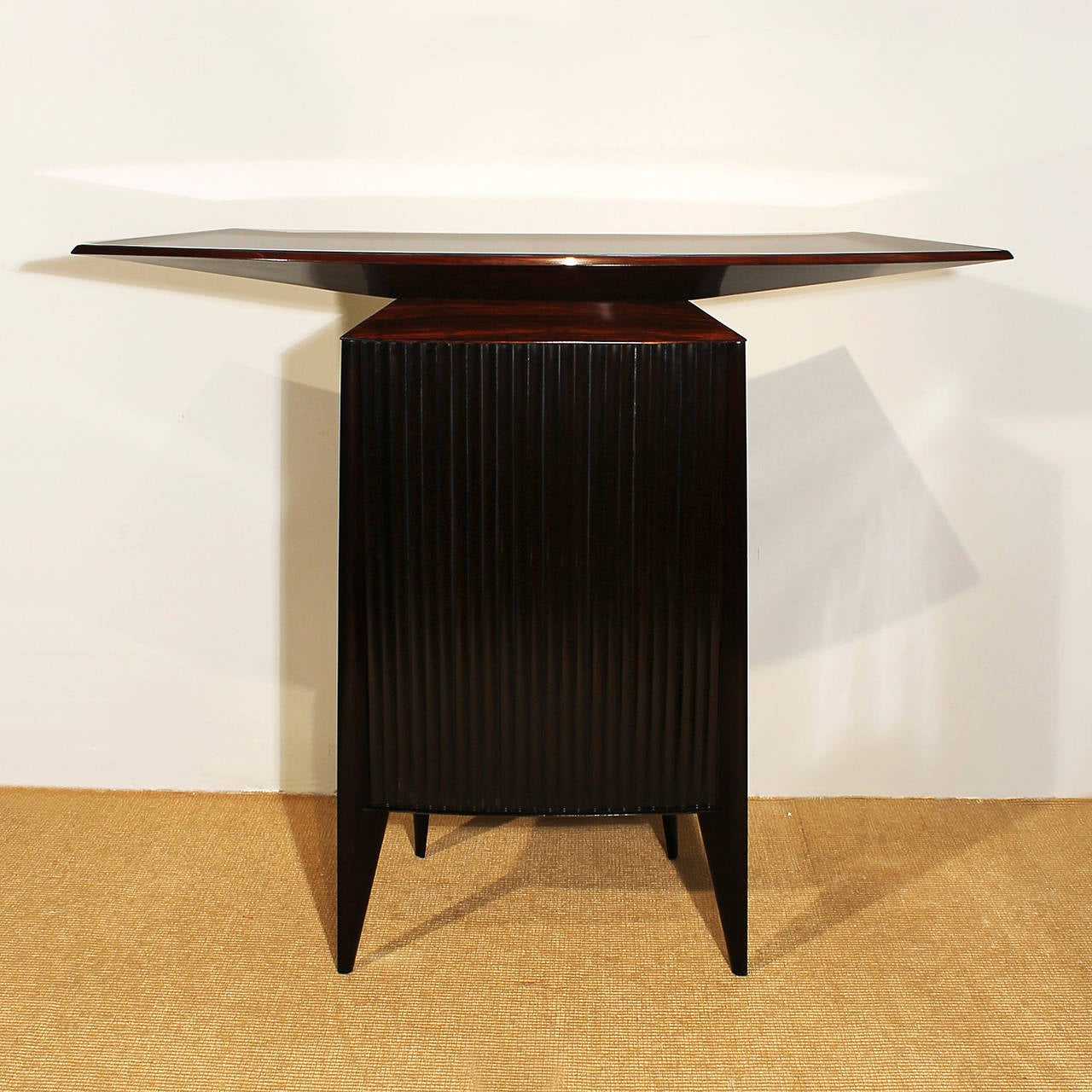 Set of bar counter and two bar stools. Counter in mahogany and rosewood veneer, French polish, black 