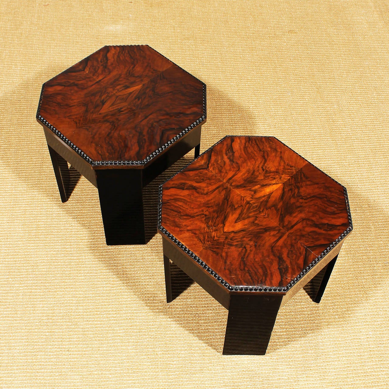 Pair of Art Deco mini tables, solid walnut and burr walnut veneer, french polish.
Spain c. 1930