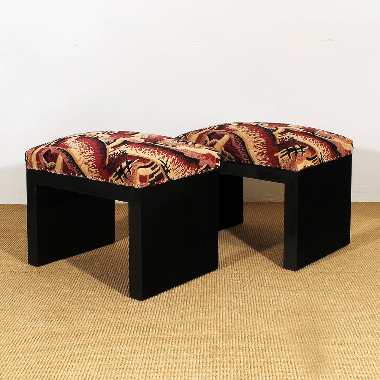 Pair of Art Deco cubist stools, black lacquered wood, original Art Deco fabric upholstery.
Spain, Barcelona c. 1930