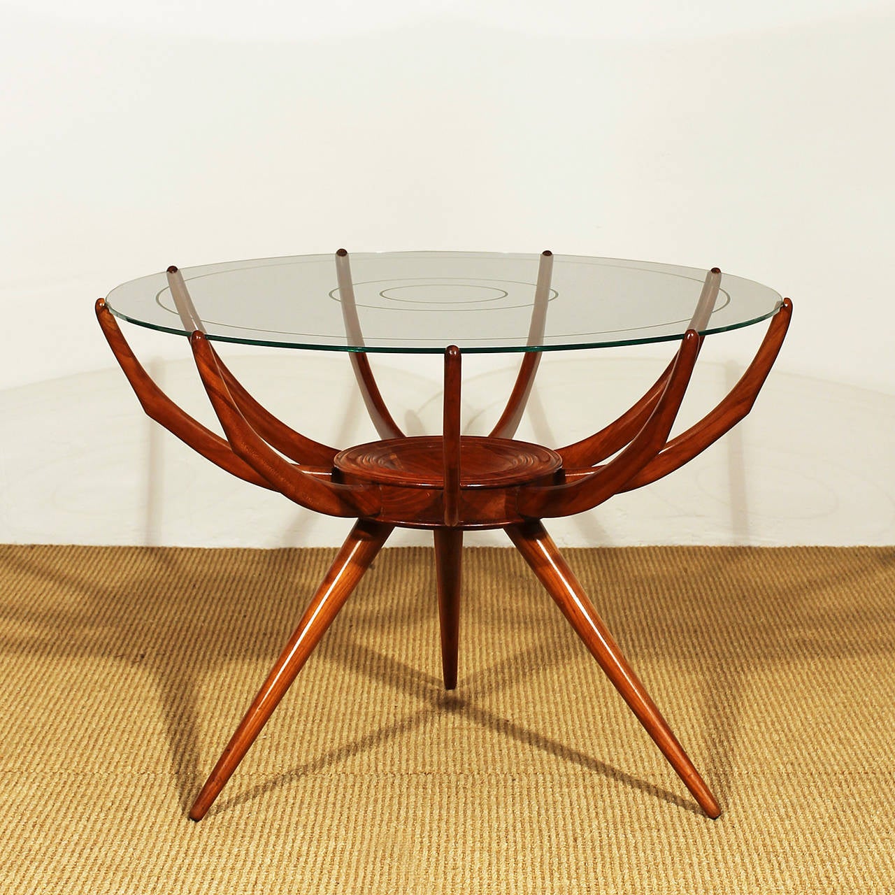 Round sidetable, spider shape chestnut stand, french polish, etched glass with concentric circles pattern on top.
Design: attr. to Carlo di Carli
Italy c. 1950