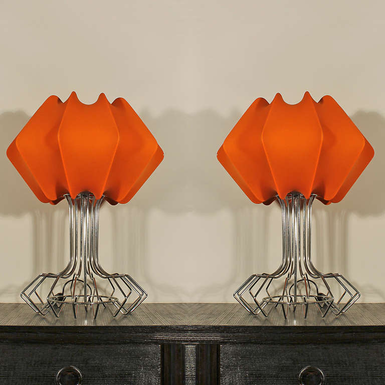 Pair of table lamps, chromed metal and orange jersey lampshade.
Edited by Carpyen
Barcelona - Spain c. 1970