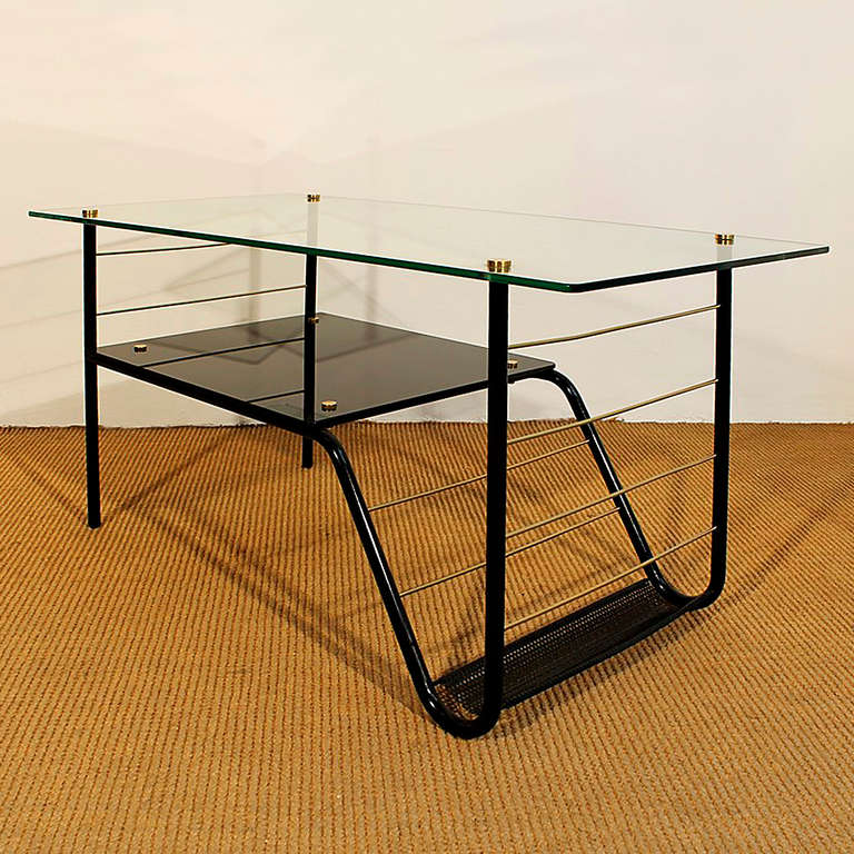 Original coffee table, black lacquered metal structure, glass, black opaline and brass hardware, magazine rack.

France, circa 1960.