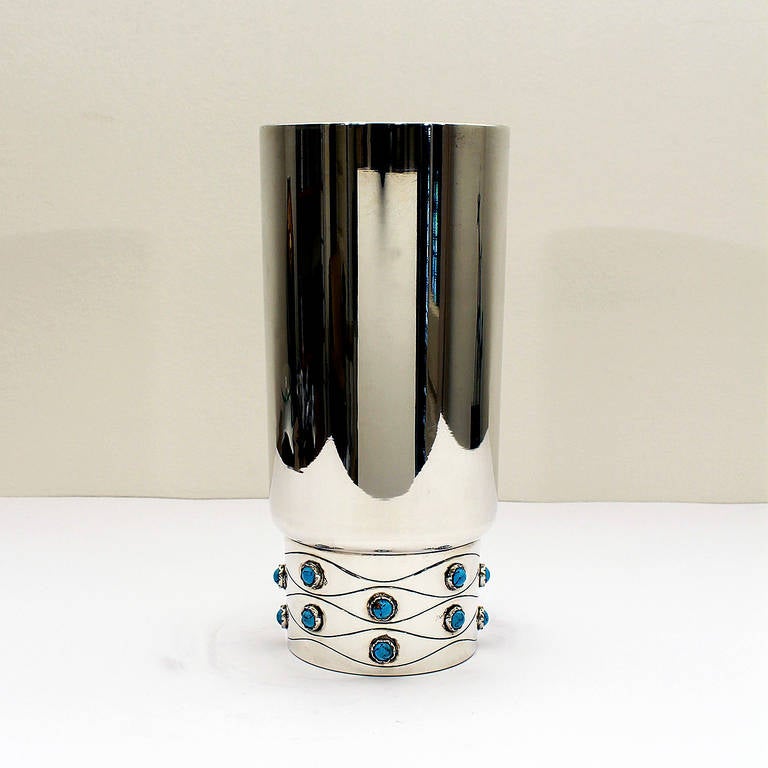 Sterling silver vase with encrustation of turquoise enamels.
Stamps:  