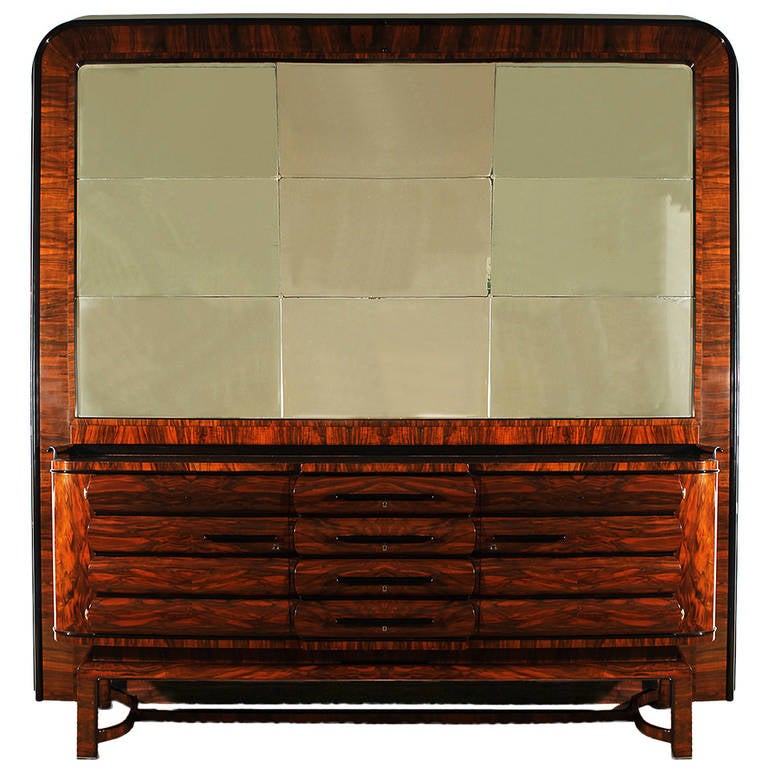 Spectacular Art Deco removable sideboard coming from a hotel in Prague, two doors and four drawers, high quality, walnut and stained walnut, nickel plated bronze hardware, great mirror.
In the style of Bruno Paul.
Czechoslovakia or Germany, circa