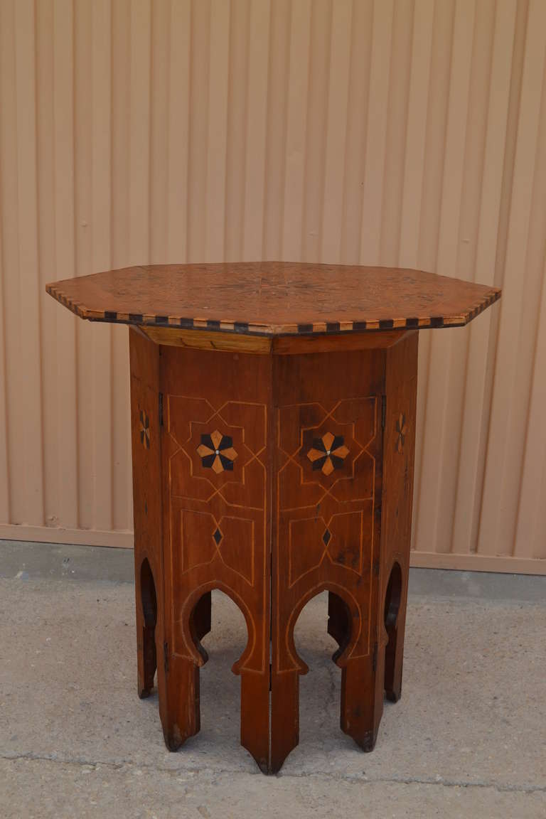 Inlaid with Mother of Pearl ,Ebony, stringing in Boxwood, Base wood for all table is either Walnut or Rosewood –difficult to tell .