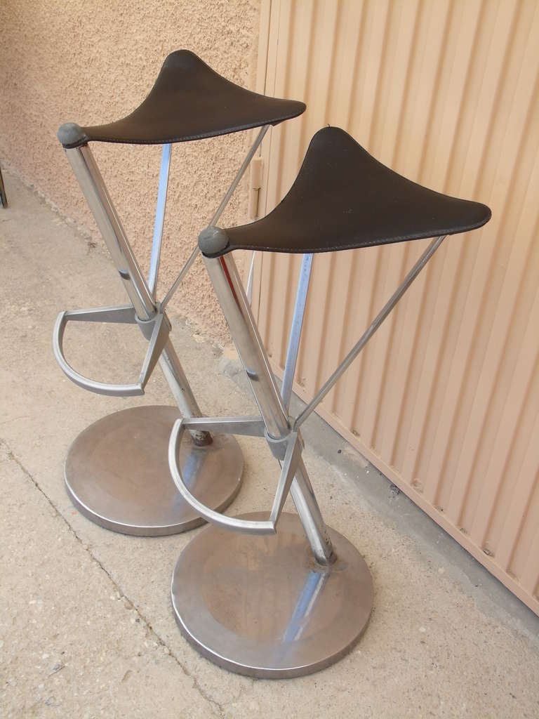 A very imposing pair of bar stools of the early style of Phillipe Starck