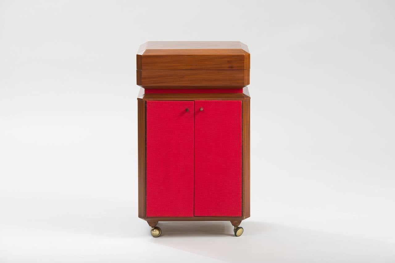 Wood, white formica and red fabric cocktail cabinet.