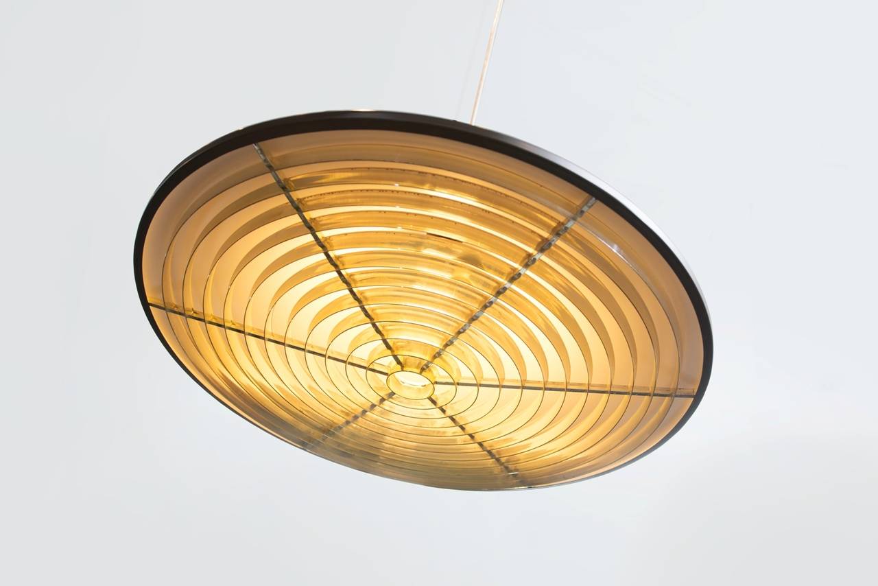 Brown lacquered metal and gild plastic ceiling lamp.
Producer: Nordisk Solar.