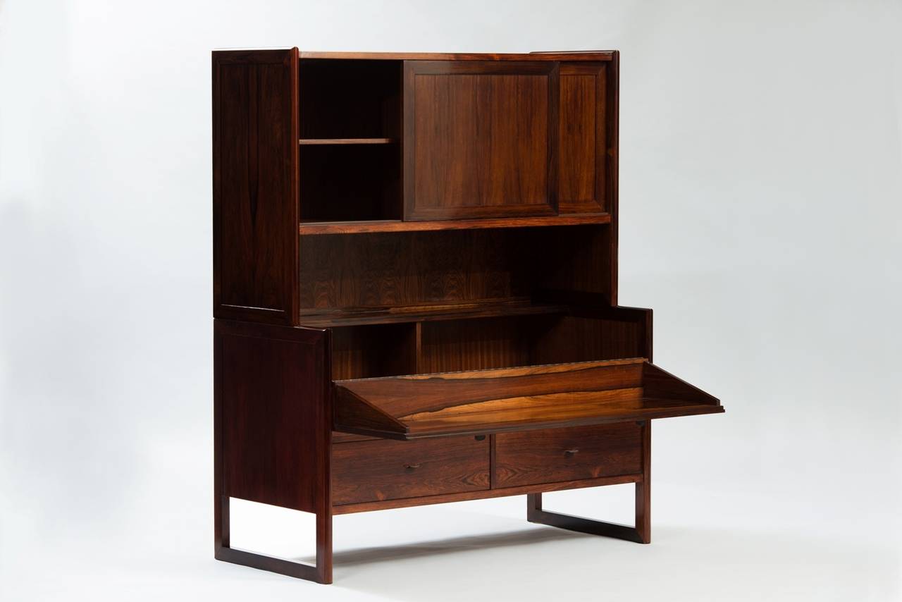 Rosewood cupboard, with leather handles.