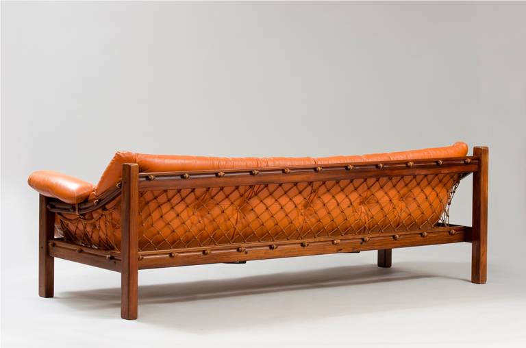 Jacaranda three-seat sofa with a leather cushion on a cotton net, Amazonas model.
Producer: Italma, Wood Art, Brazil.