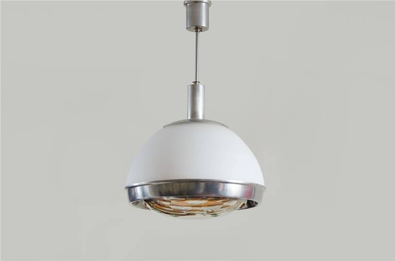 Frosted and transparent faceted glass ceiling lamp.
Producer: Lumi.