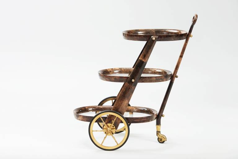 A three-tier goatskin cart with brass wheels.