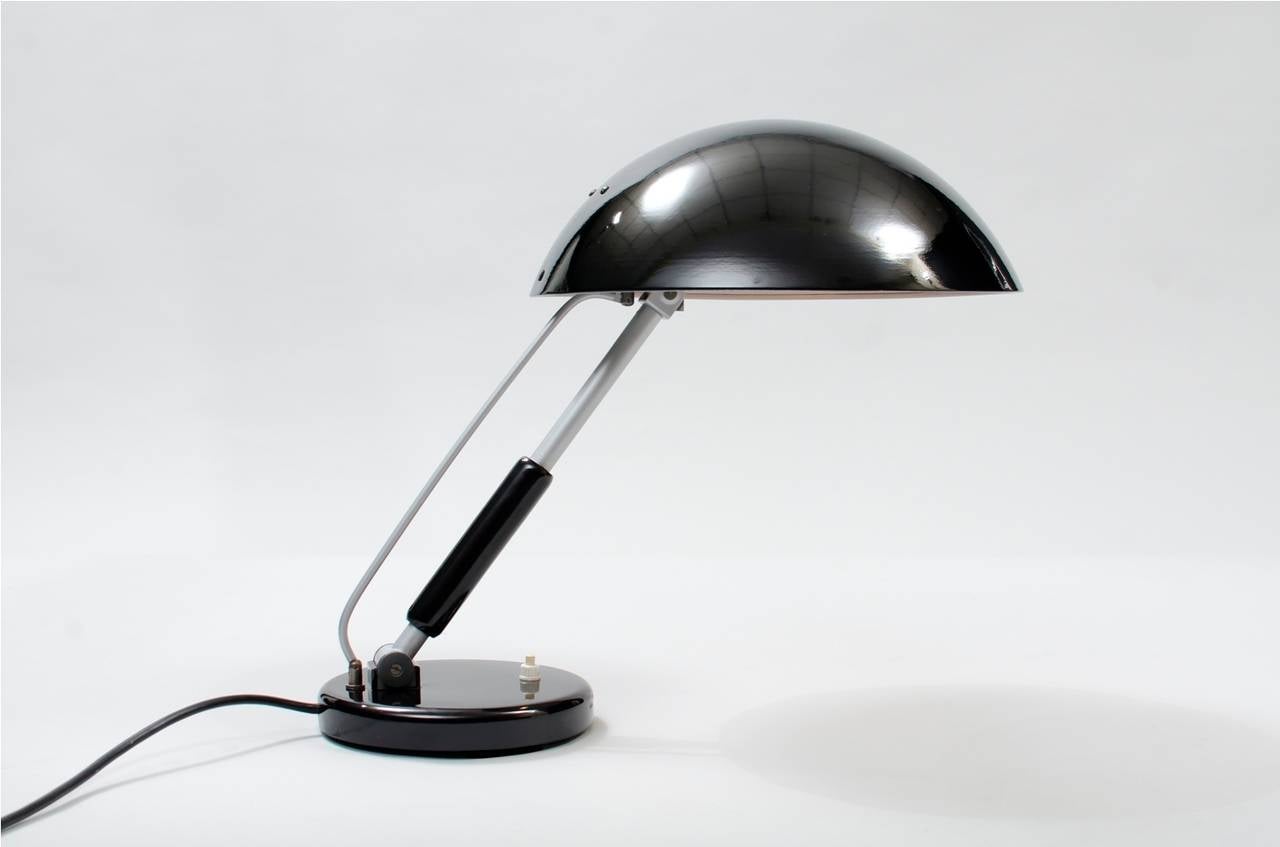 Modernist desk lamp, metal and chrome-plated tubular stem.
Producer: G. Schanzenbach.