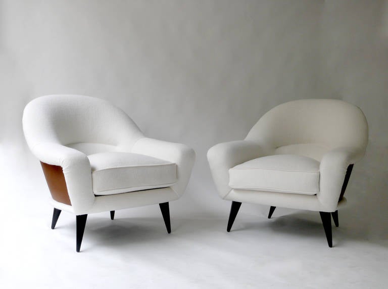 Charles Ramos armchairs, in leather and boiled wool.