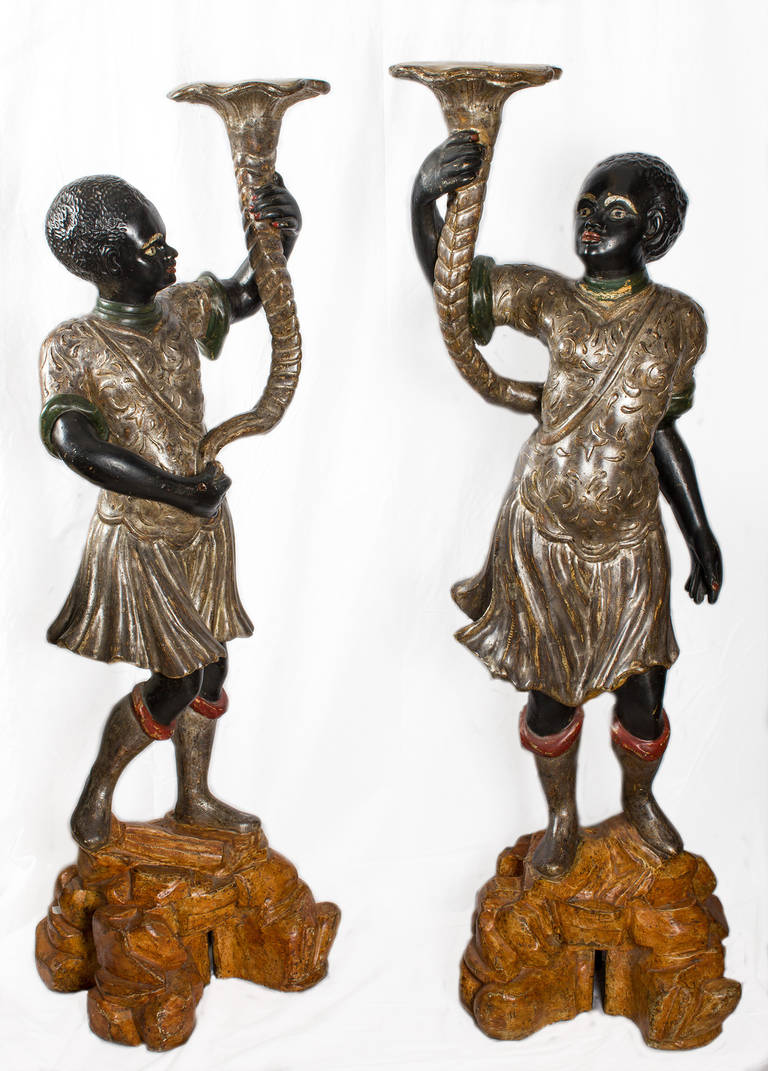 Pair of Venetian statues candleholders 142 cm tall in the shape of blackamoor figures.