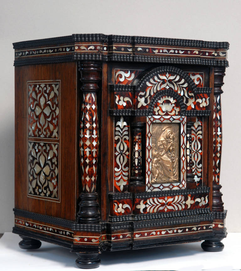 Exotic wood, tortoise shell and mother-of-peal tabernacle.