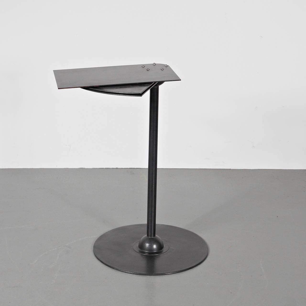 Rare side table after the design by Pierre Chareau, circa 1920, manufactured around 1970.

The table is completely made of high quality metal. It is a recent edition of Pierre Chareau's famous design.

In great original condition with minor wear