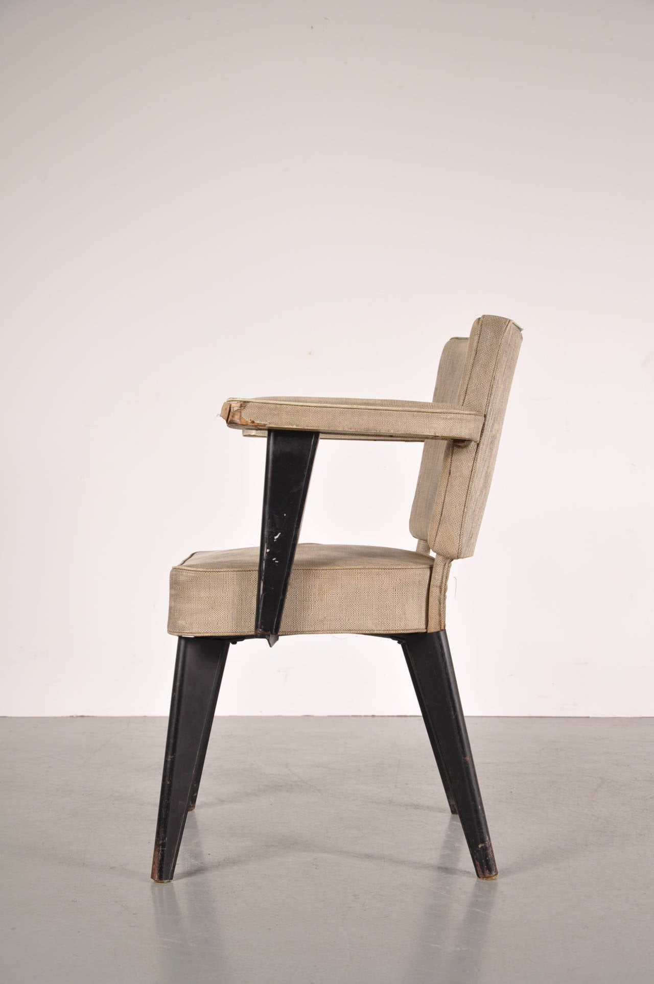 Unique completely original armchair by Dominique, manufactured around 1960.

This unique chair was designed as a dinner chair for the officers of the flagship French aircraft carrier 