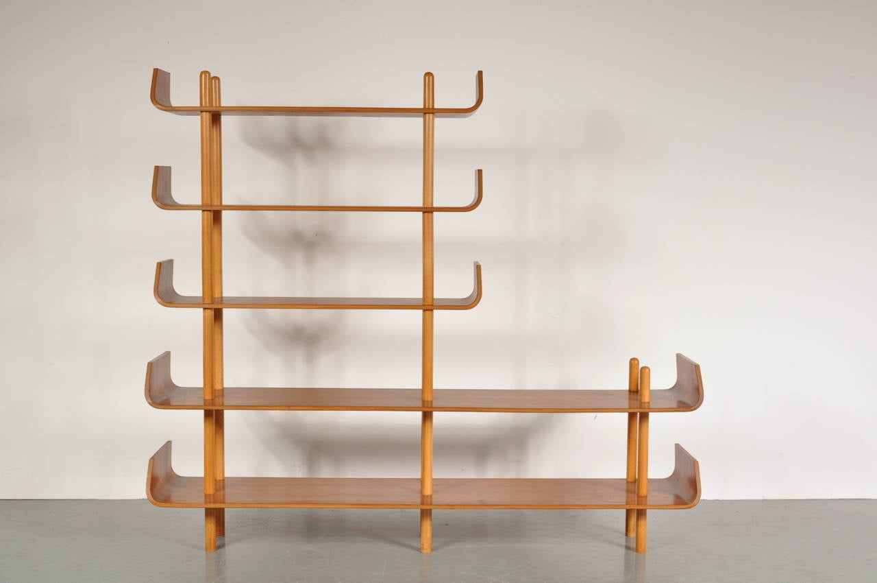 Beautiful bookcase by Willem Lutjens for De Boer Gouda, manufactured in The Netherlands in 1953.

It has birch stands and teak plywood shelves, a rare and beautiful version of this bookcase, that is one of the most iconic pieces in Dutch design.