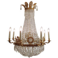 A large Restauration period gilded bronze and crystal waterfall chandelier