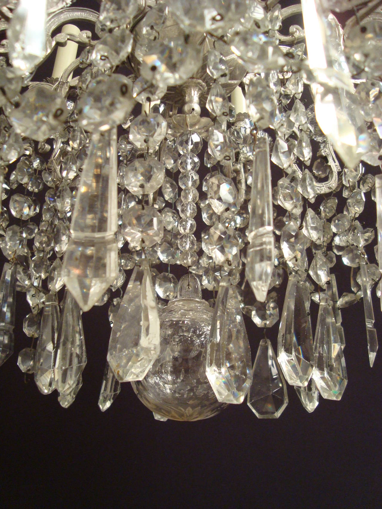 French A most attractive silvered bronze and crystal chandelier, attributed to Baccarat