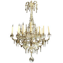 A large silvered bronze and crystal chandelier