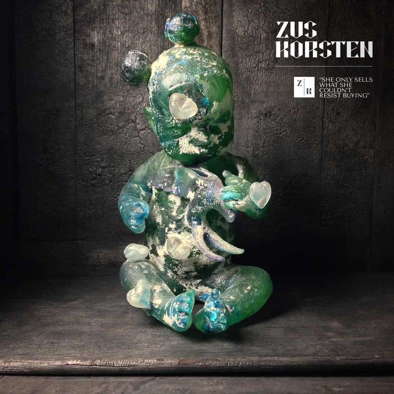 Made by the Dutch/British artist Richard Price and part of the collection from the Dutch Glass Museum. The baby is decorated with roses, hearts and parts of toy animals. The sculpture is semi translucent and changes color depending on the lighting.