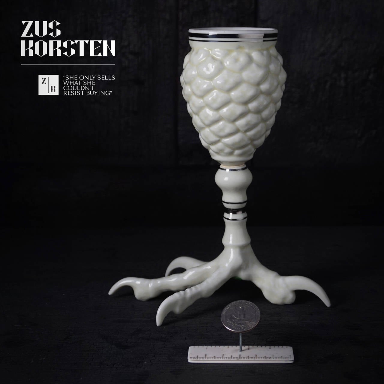 This white porcelain pinecone wineglass with bird claw foot makes a fantastic 'happy hour' piece.
It is in mint condition.
A very collectable and decorative find.