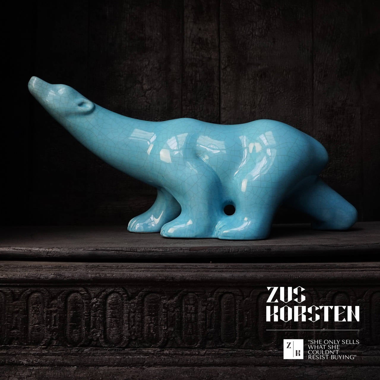 Stunning ice blue polar bear, covered with a crackled glaze, impressed and printed L and V Ceram, in mint condition.