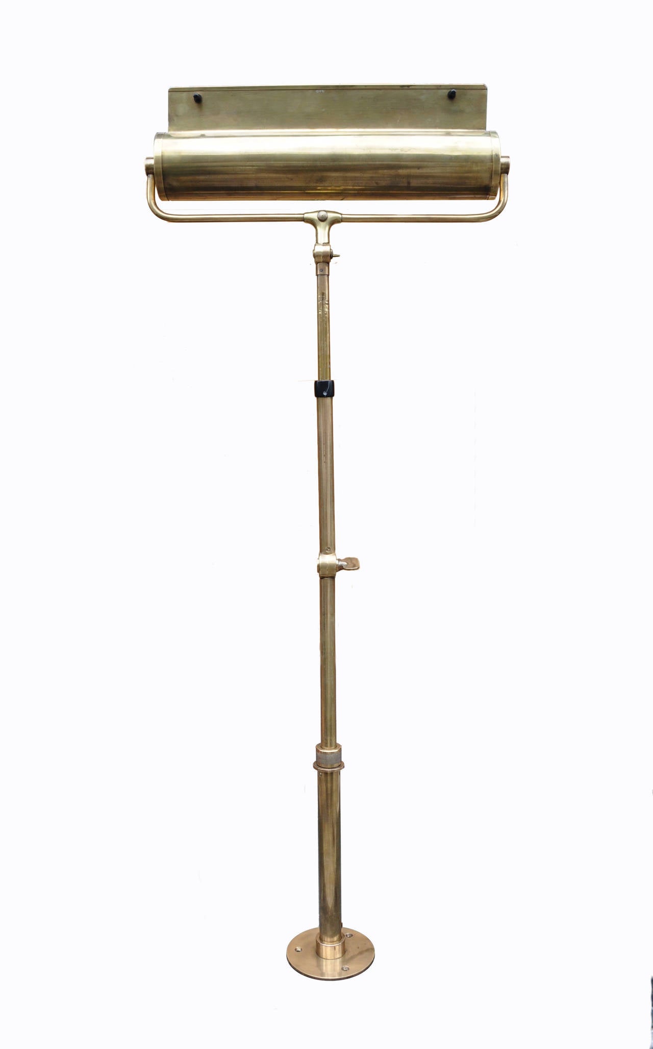 Architectural table or wall mount lamp with dual telescopic and articulated juncture. The telescopic range and heavy dual pivoting joints allows a wide range of light possibilities. In full vertical telescopic the system extends from 31-42”
The