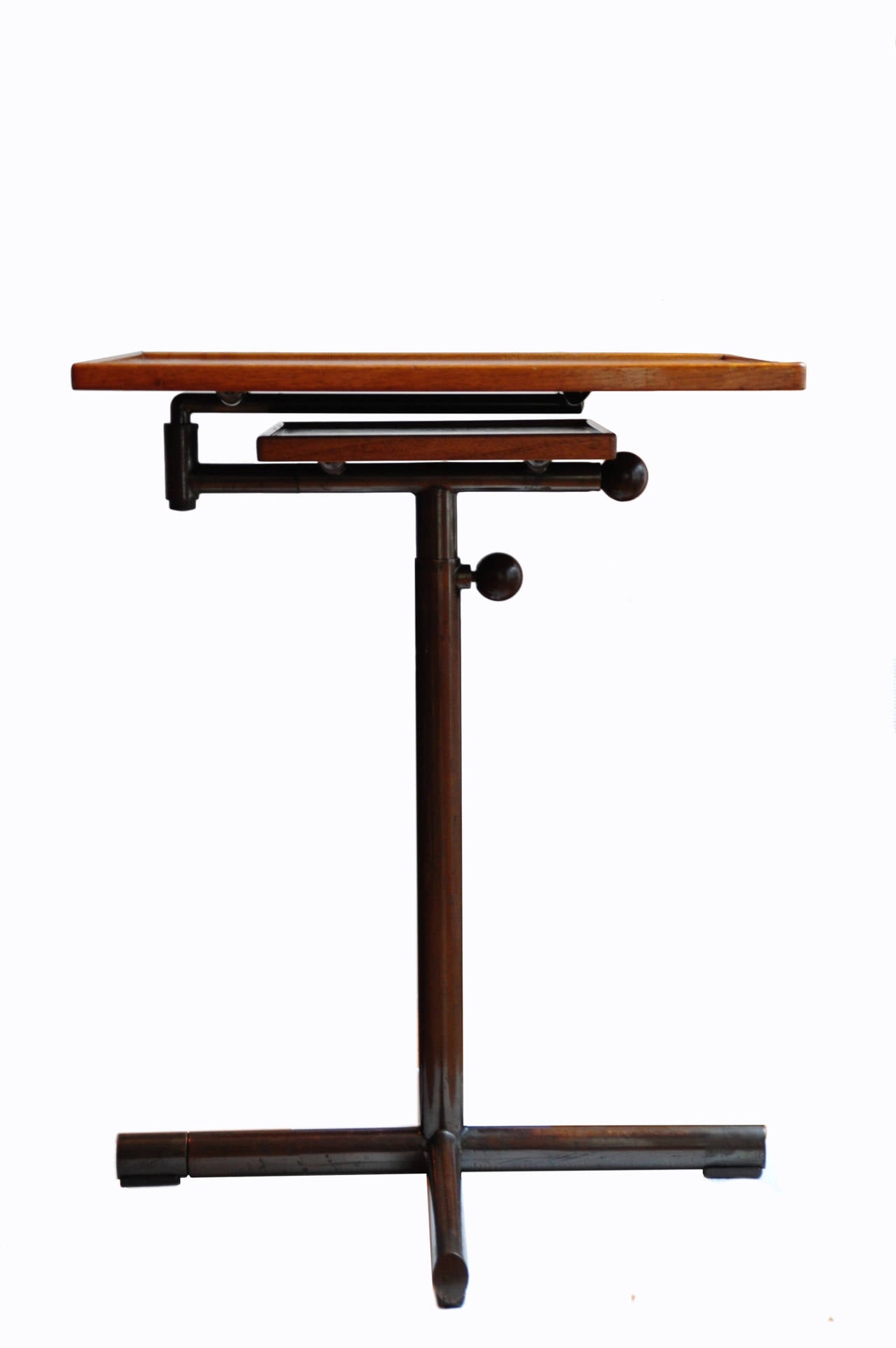 Functional and immensely practical pair of tables by Embru, Switzerland, 1940s edition. The tables look great in any modern interior and works equally as bedside or end tables. The copper plated steel structure is in excellent condition, see detail