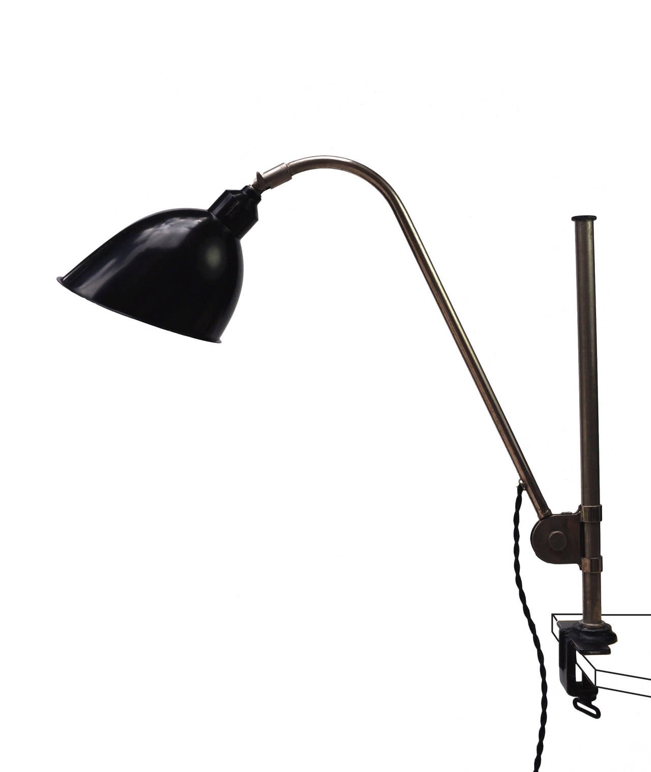 An early to mid-1930s Belmag edition clamp lamp. The model is tightly associated with the Rodella and Frankfurt editions by Christian Dell during the prewar years.
The model offered here is an especially rare edition from the Swiss lighting