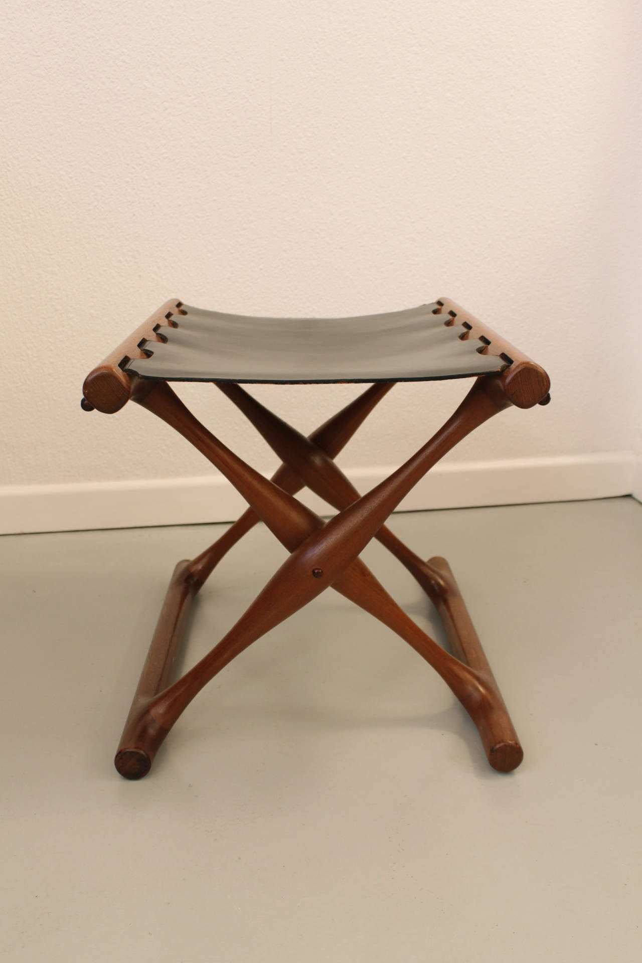 Guldhoj teak and leather folding stool by Poul Hundevad
Solid teak and black leather, very good condition
Original leather with labels
Denmark ca.1957