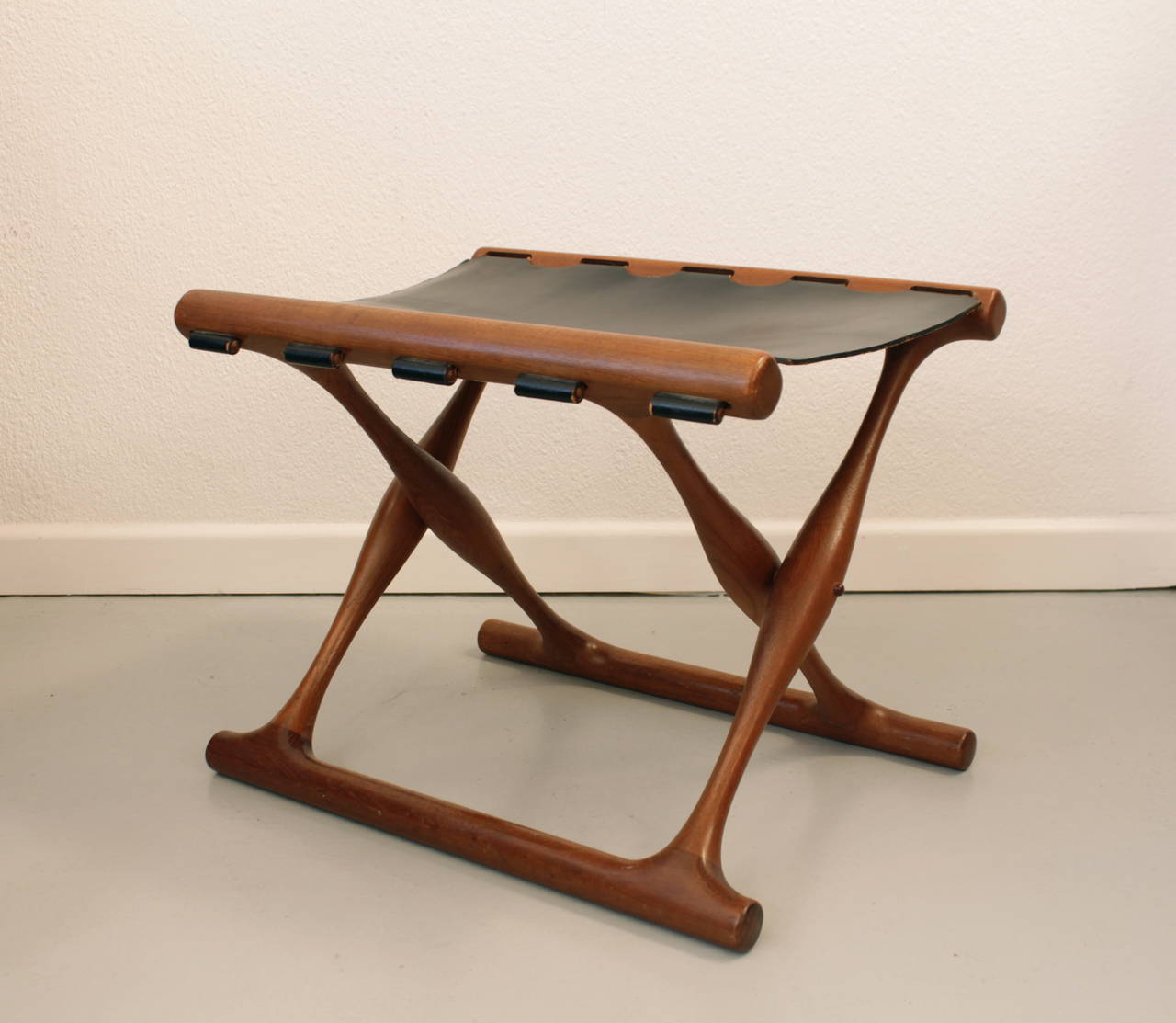 Guldhoj teak and leather folding stool by Poul Hundevad
Solid teak and black leather, very good condition
Original leather with labels
Denmark ca.1957