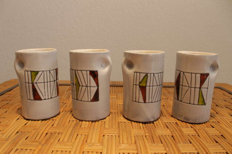 Set of 4 glazed ceramic mugs by Roger Capron
