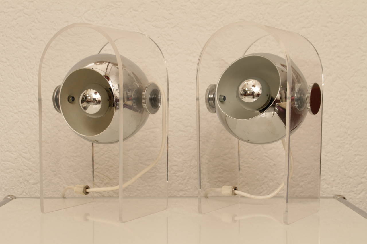 Pair of table lamps by Robert Sonneman, lucite and chrome sphere.
Perfect original condition