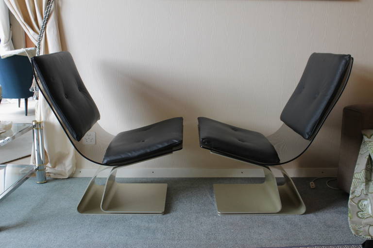 Maison Jansen pair of glass & leather lounge chairs
Reupholstered in black leather
Steel base, Saint Gobain tempered glass