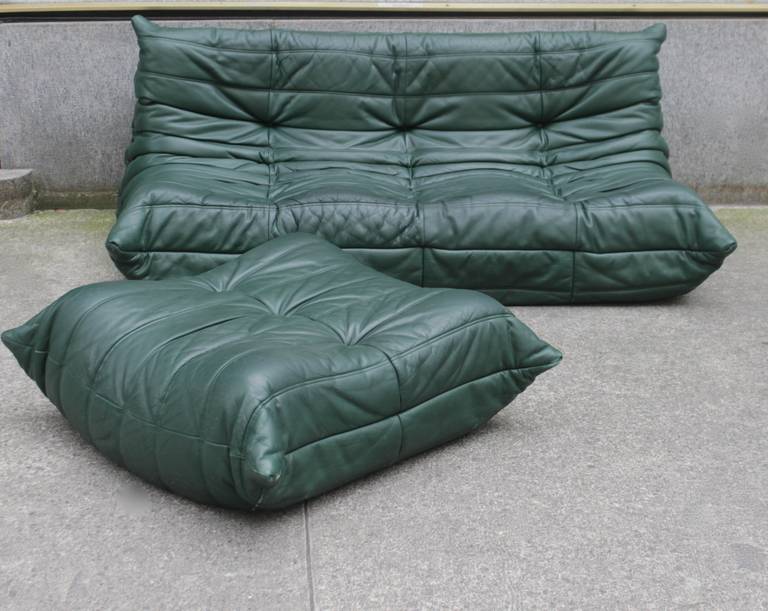 Togo 3 seater sofa and ottoman by Ligne Roset, green forrest leather.
Good condition.